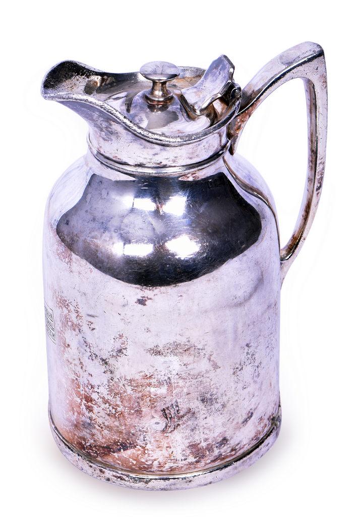 Canadian National Railway Thermos Pitcher 7 3/4": Pitcher is engraved on the side with the Canadian National System box logo and bottom stamped Super Thermos Stronglas Thermos Bottle Co. Ltd. Toronto Canada. Measures 4 5/8" x 7 3/4" tall and shows he