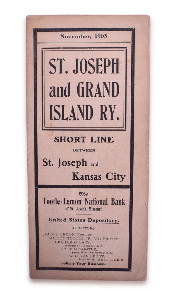 St. Joseph and Grand Island Railway Timetable November 1903: A St. Joseph and Grand Island Railway timetable effective November 1903 for the short line between St. Joseph and Kansas City in plastic sleeve. The early timetable shows standard signs of wear on the
