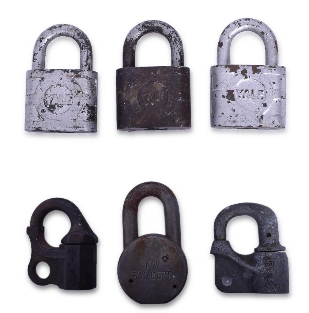 Six Railroad Signal Department Locks - Nickel Plate, Norfolk and Western, RACO, Western Railroad: Group of six railroad signal locks including three Yale Nickel Plate stamped with NKP on the body above the Yale casting, American Norfolk and Western with NW S&C DEPT. stamped into the body, Western 