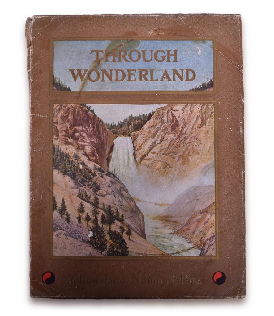Through Wonderland Yellowstone National Park Northern Pacific Railway Illustrated Book 1910: Through Wonderland Yellowstone National Park illustrated book for the Northern Pacific Railway dated 1910. The 69 page soft bound booklet is illustrated with color and black & white photos and a map o