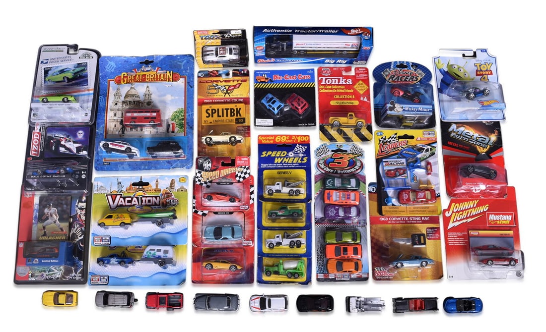 Group of Thirty-Five Die Cast Toy Cars - Speed Wheels, Corvette, IZOD, NFL, Disney Racers, USPS,: A mixed group of thirty-five die cast toy cars in 1:64 scale with one 1:58 scale. The majority are new in original packaging. The 1:58 scale car is the NFL Bear PT Cruiser, new in packaging. 1:64 scal