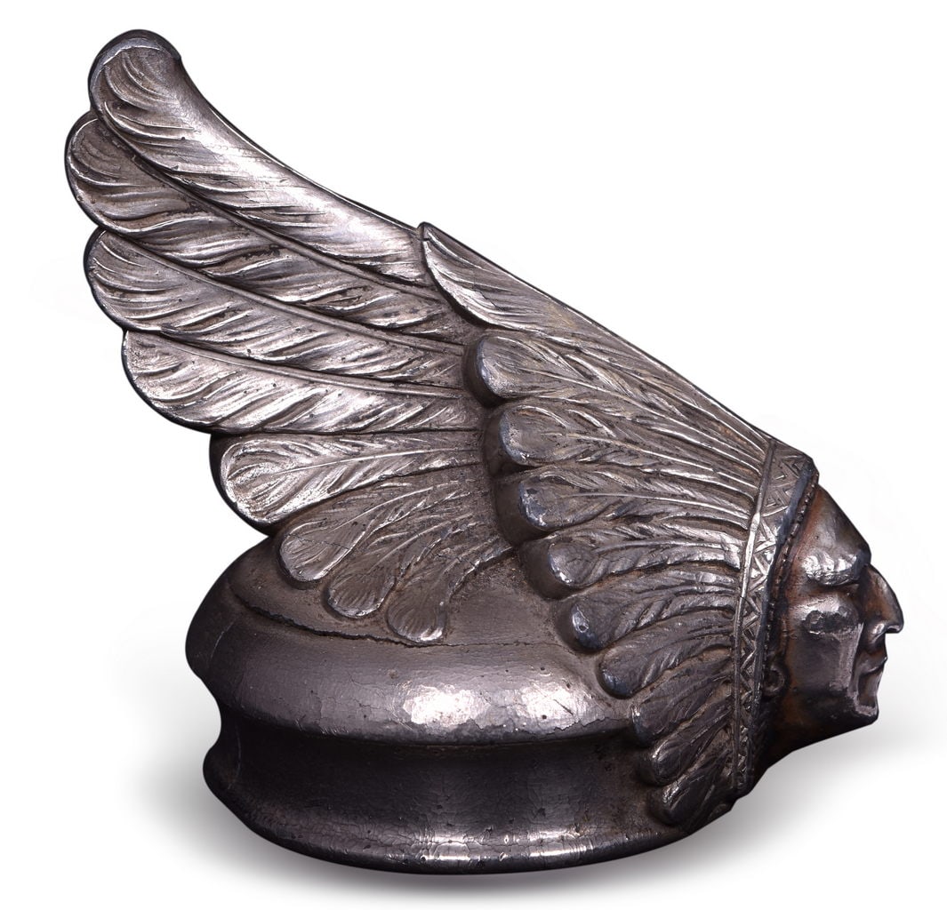1927 Pontiac Indian Head Hood Ornament: 1927 Pontiac indian head hood ornament. This ornament was cast zinc like many ornaments of the time and has areas of casting failure specifically the base ring where it has cracked and separated from