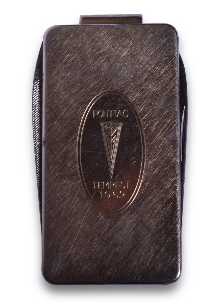 1962 Pontiac Tempest / GTO Dealer Promotional Pocket Knife / Money Clip: 1962 Pontiac Tempest engraved pocket knife / money clip made by Anson. Engraved with the Pontiac arrowhead and Tempest 1962 on the front. Anson on the reverse. Shows light pocket wear, but presents ni