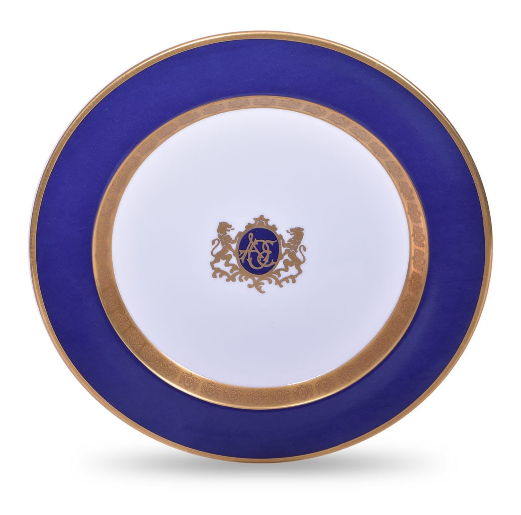 American Orient Express China Service Plate 12 1/4": A 12 1/4" china service plate for the American Orient Express. The plate is top marked with the AOE graphic and bottom stamped with the American Orient Express story Serial number 414 ChinaConcepts Go