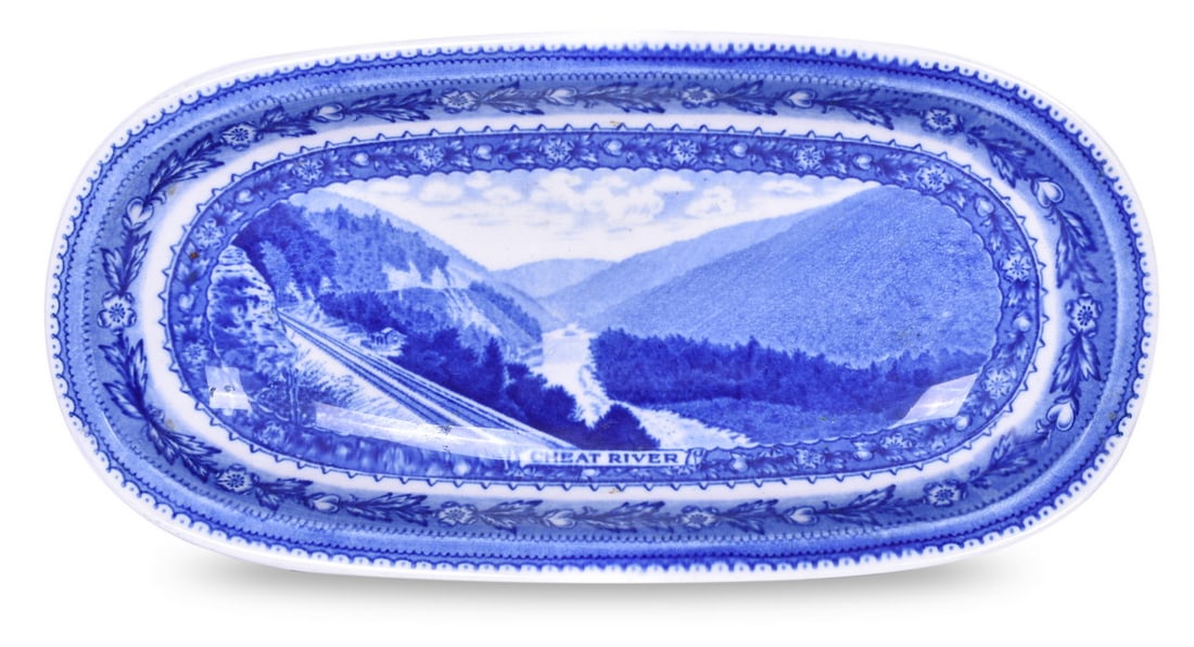 Baltimore and Ohio Railroad China Centenary Oval Bread Dish: A 12" x 6" china bread dish for the Baltimore & Ohio Railroad in the Centenary pattern, bottom stamped 1827-1927 Baltimore & Ohio Railroad Scammell's Lamberton China Design Patented. The dish shows li