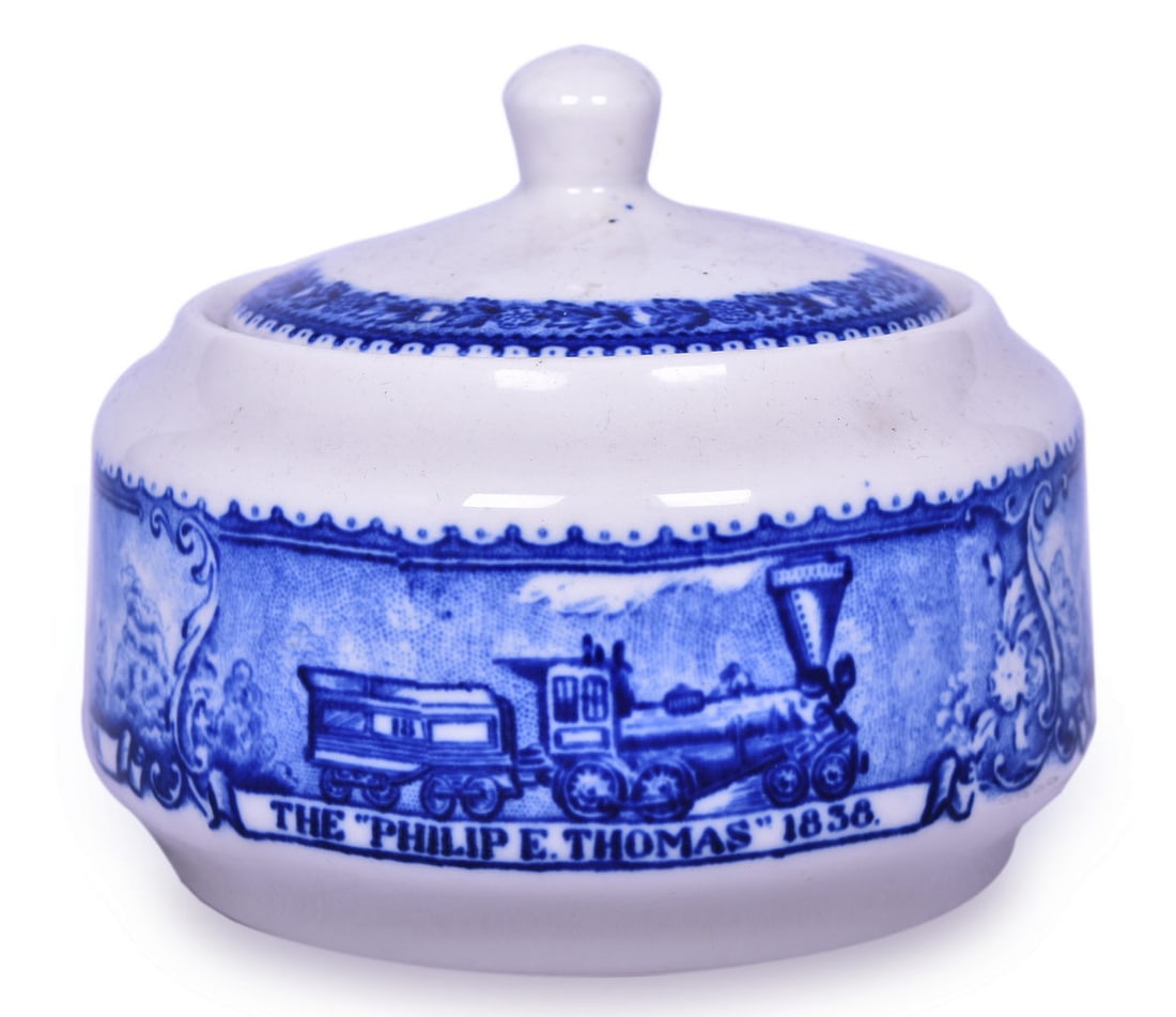 Baltimore and Ohio Railroad China Centenary Covered Sugar Bowl: A 4 1/4" china sugar bowl with lid for the Baltimore & Ohio Railroad in the Centenary pattern, bottom stamped 1827-1927 Baltimore & Ohio Railroad Scammell's Lamberton China Design Patented. The shows