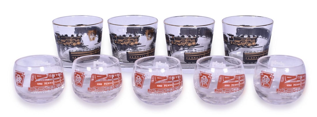 Nine Pennsylvania Railroad Glasses - Roly Poly and Low Ball: A group of nine Pennsylvania Railroad drinking glasses. Includes five 2 1/4" roly-poly style glasses with Keystone logo in red and 4902 train, showing minimal signs of use with a few small scratches a