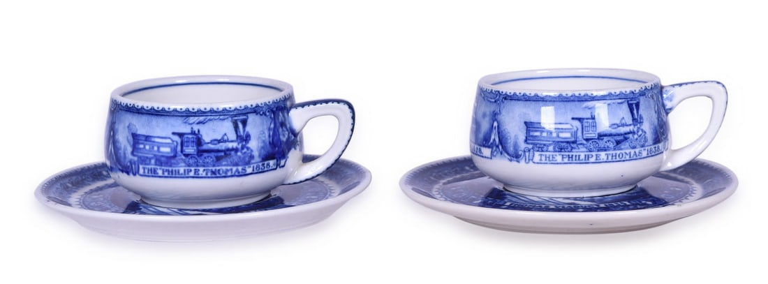 Pair of Baltimore & Ohio Railroad China Centenary Blue Line Coffee Cups and Saucers: Two blue line coffee cup and saucer sets for the Baltimore & Ohio Railroad in the Centenary pattern, all bottom stamped 1827-1927 Baltimore & Ohio Railroad Scammell's Lamberton China Design Patented.