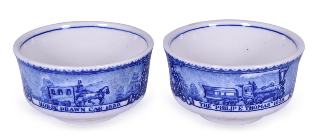 Pair of Baltimore & Ohio Railroad China Centenary Blue Line Bouillon Cups: A pair of 3 3/4" china bouillon cups for the B&O Railroad in the Centenary pattern with the blue line, bottom stamped 1827-1927 Baltimore & Ohio Railroad Scammell's Lamberton China Design Patented. Th
