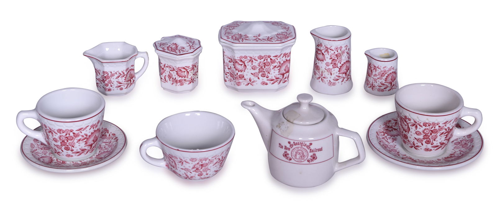 Twelve Pieces of Kansas City Southern Railroad Roxbury China and New Georgia Railroad Teapot: Twelve Pieces of Kansas City Southern Railroad Roxbury China and New Georgia Railroad Teapot A mixed group of dining car china in the Roxbury pattern for the Kansas City Southern Lines Railroad by Syr