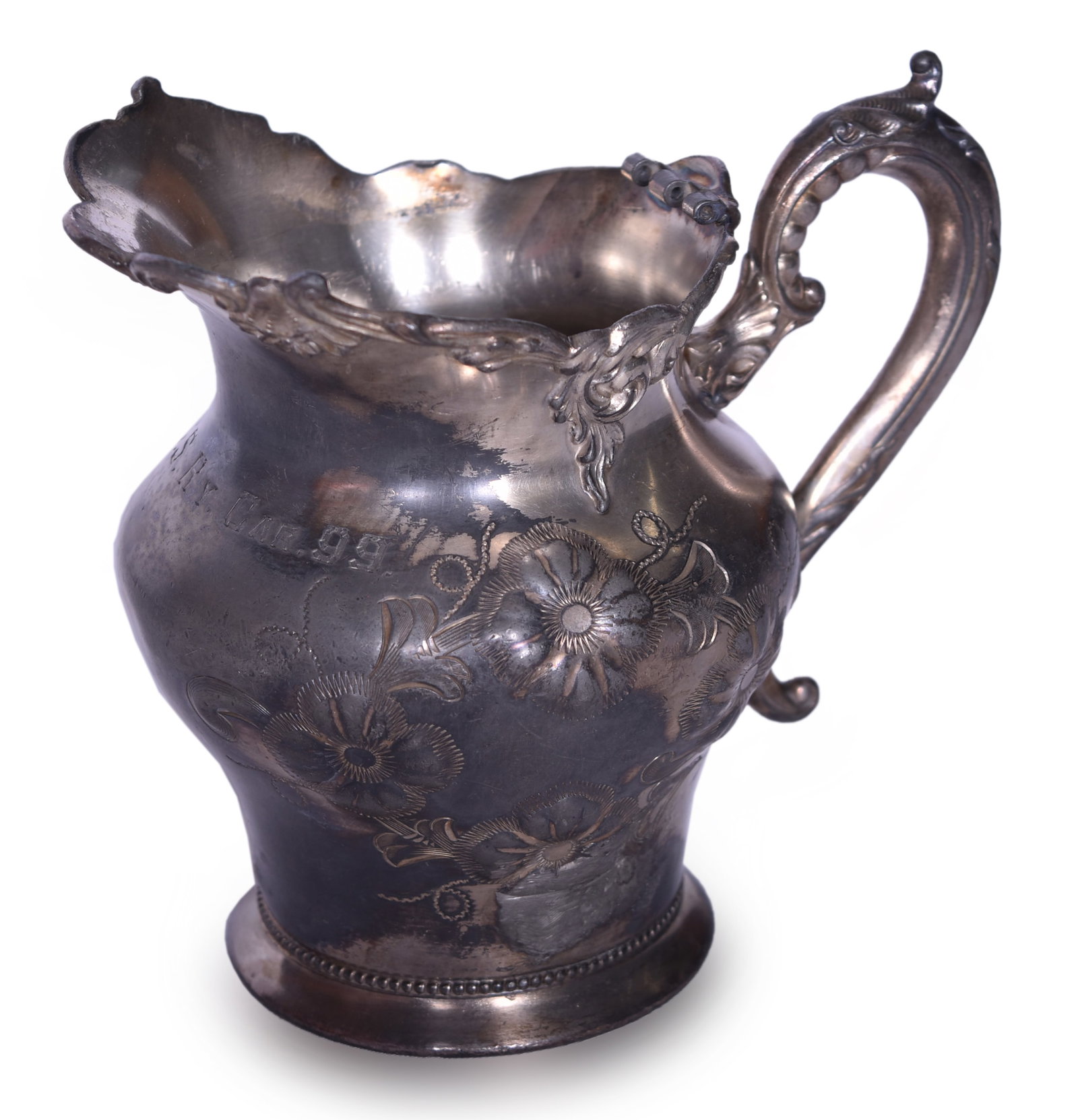 Superior Silver Co. Kansas City Southern Railway Car 99 Creamer: Superior Silver Co. Kansas City Southern Railway Car 99 Creamer A handled creamer with embossed ornate floral design for Kansas City Southern Railway, stamped K.C.S. Ry. Car. 99. across the front, and