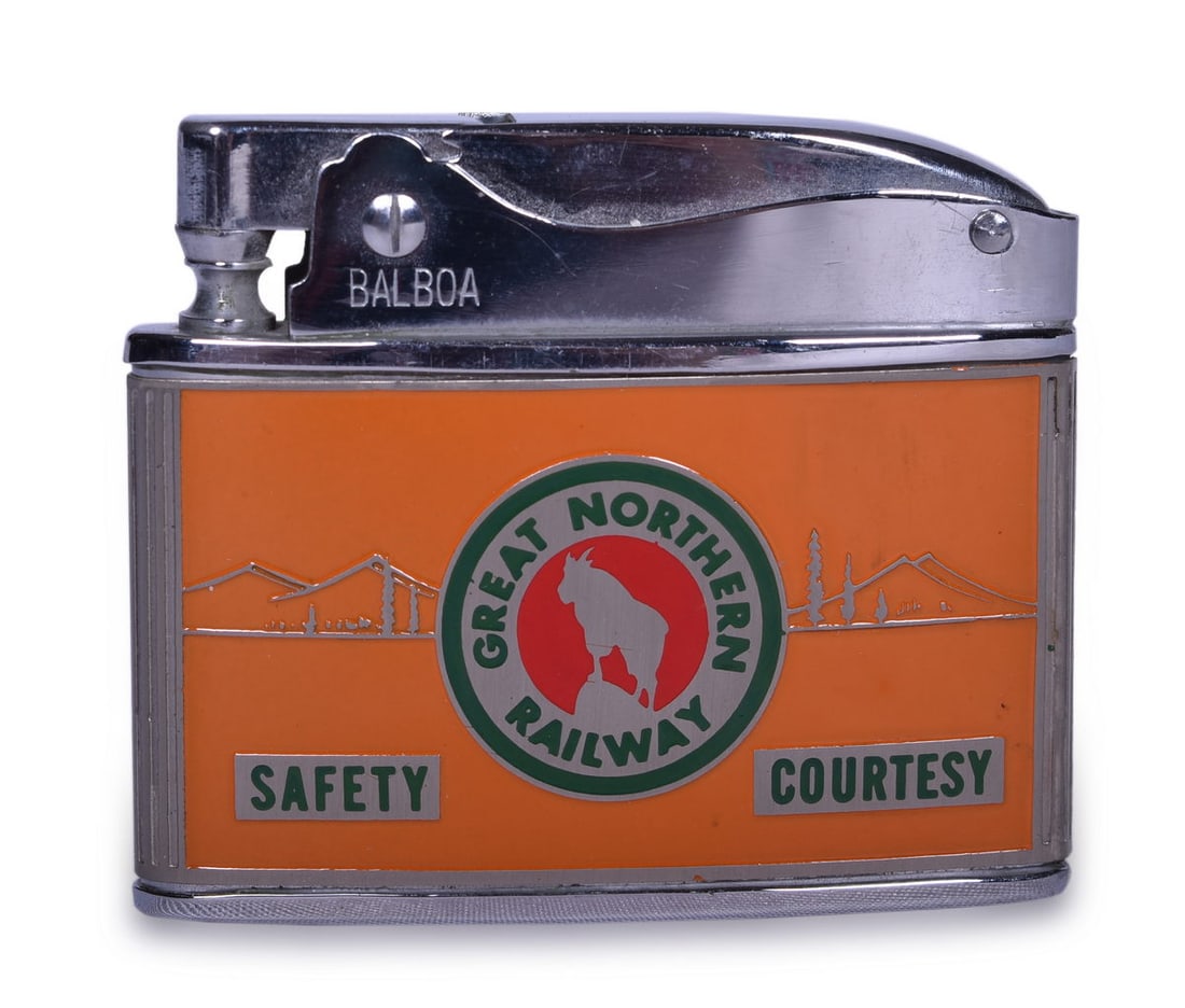 Great Northern Railway Enameled Lighter - Safety Courtesy Personnel Department: Great Northern Railway Enameled Lighter - Safety Courtesy Personnel Department A lighter for Great Northern Railway by Wellington Balboa. One side shows a green and red goat logo with orange enameled 