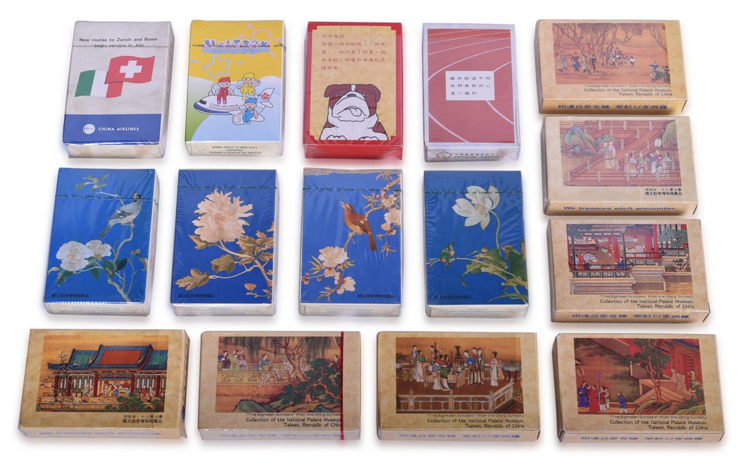 Fifteen Decks of China Airlines Playing Cards Including New Old Stock: A collection of souvenir playing cards advertising China Airlines by Royal Playing Cards Taiwan and Kuo Kau Paper Products, mostly sealed in original cellophane packaging or opened but unused. All dif