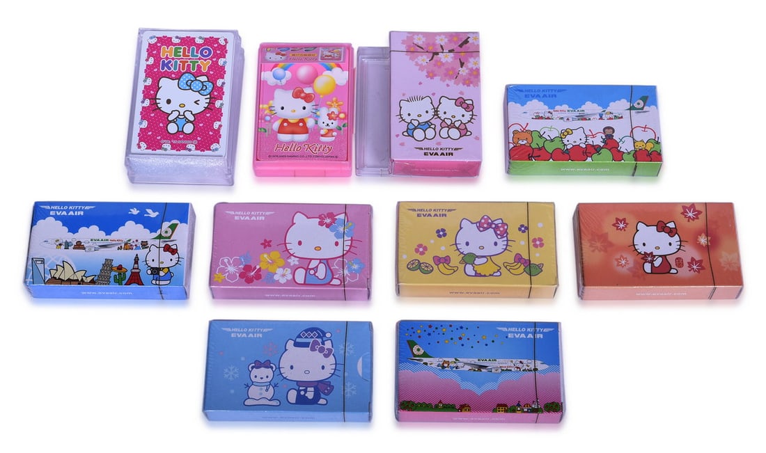 Ten EVA Air Hello Kitty Airline Playing Card Decks: A group of advertising playing card decks for EVA Airways Taiwan featuring Hello Kitty and other Sanrio characters, in different designs. Almost all are new old stock in original cellophane packaging.