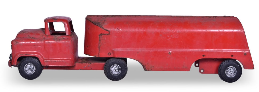 Buddy L Pressed Steel GMC 550 Texaco Tanker Toy Truck: A pressed steel red tanker truck by Buddy L measuring 24" long x 6" tall. There are no decals or appearance that there ever were on the doors or side of the cab but there is a sticker on the bottom th