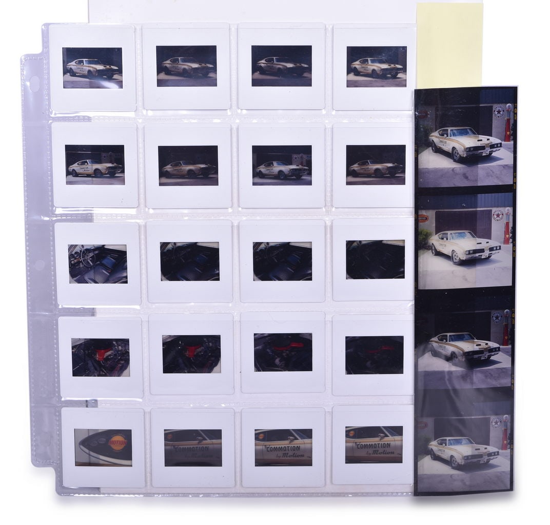 24 Slides and Negatives Featuring 1969 Hurst Olds Commotion Drag Racing Car by Motion Performance: A group of 20 slides and a strip of four negatives featuring the 1969 Hurst Olds Commotion drag racing car by Motion Performance. They appear to be magazine quality photographs possibly considered for