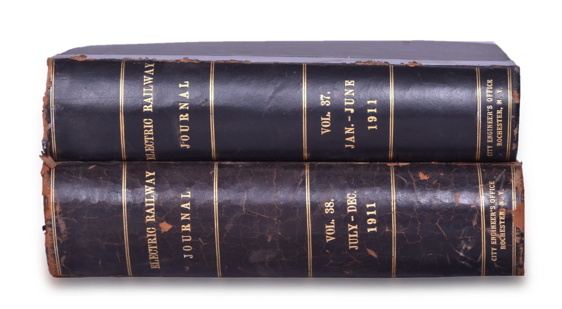 1911 Electric Railway Journal Encyclopedias Volume 37 and 38: A pair of 1911 Electric Railway Journal encyclopedias by McGraw Publishing Co. for the City Engineer's Office Rochester New York, measuring 9 1/2" x 11 3/4" with hardbound cover, leather spine and cor