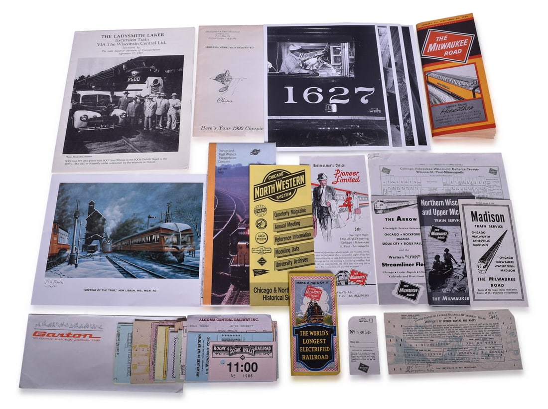 Assorted Chicago Milwaukee and St. Paul Railway, Milwaukee Road Papers: Approximately 80 pieces of railroad tickets, timetables, and more!Includes:Blank Chicago Milwaukee and St. Paul Railway notebook with grid paperA print of Russ Porter's painting "Meeting of the Tribe"