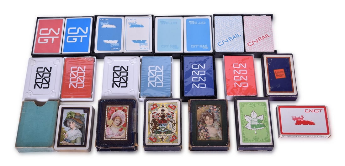 Nineteen Canadian National & Grand Trunk Railway Playing Card Decks: A group of nineteen playing card decks for Canadian National Railroad and CNGT spanning 1905 to 1985, including new old stock.A wide souvenir deck of CN-1 Bonnet Flowers Behind circa 1905, with 52 pla