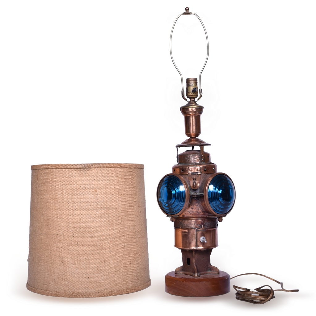 Armspear Switch Lamp Converted to Table Lamp: Adams & Westlake switch lamp with copper plated body that has been converted into a table lamp. The lamp is attached to a wooden base and has been modified with a hole for a switch along the bottom of