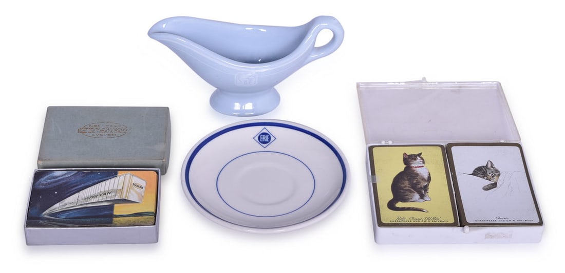 Group of Northeast Railroad China and Playing Cards - New York, New Haven & Hartford, Erie, New York: A group of railroad dining car and passenger car items. Dining car china includes a Buffalo China sauce boat in the platinum blue pattern for New York, New Haven & Hartford Railroad, bottom stamped Ma