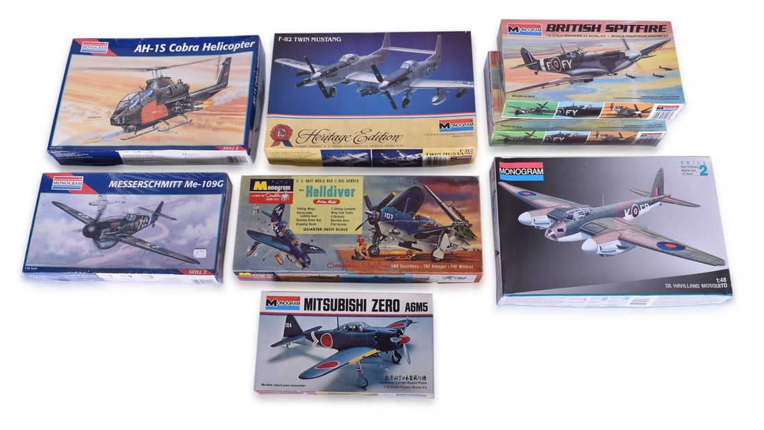 Eight Unassembled Monogram Scale Model Plane Kits - Helldiver, British Spitfire, Mitsubishi Zero (1 of 3)