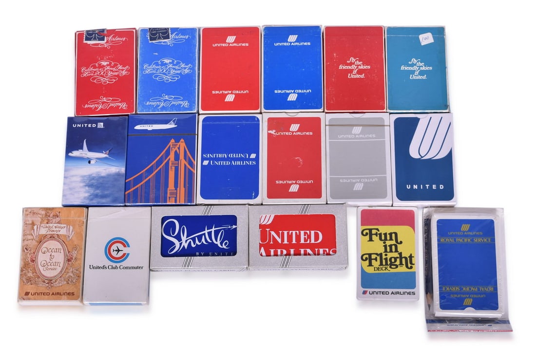 Eighteen United Airlines Playing Card Decks Including New Old Stock: A large group of single playing card decks advertising United Air Lines, all in different designs. Ten decks are sealed and almost all of the other decks show minimal to no use of the playing cards, b