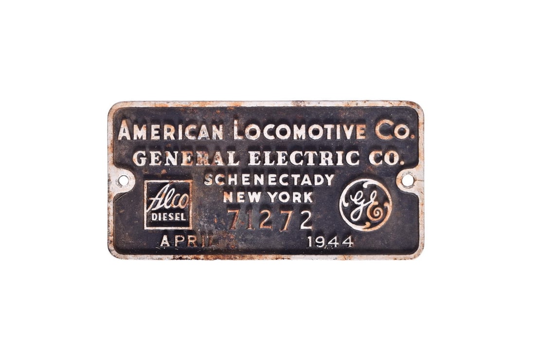 ALCO / General Electric New York Central S-1 Switcher #832 Builders Plate: Alco cast builders plate from New York Central S-1 switcher #832. Plate shows a build date of April 1944 and a serial number of 71272. Plate measures 12" x 6" and has older paint and some surface rust