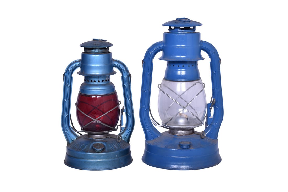 Pair of Dietz Lanterns - No. 8 Air Pilot and Little Wizard: Two Dietz lanterns, one marked Little Wizard, the other No. 8 Air Pilot. Both lantern bodies are in great condition with little to no rust and no major dents or damage. Both have their burner pots and