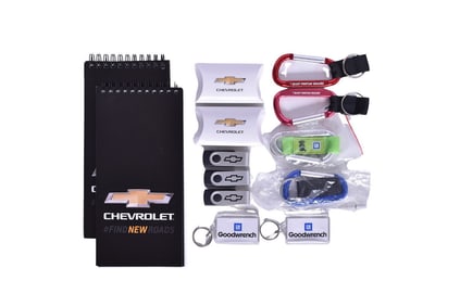 Group of General Motors Dealership and Promo Smalls - USB Drives, Key Chains, Note Pads, etc.