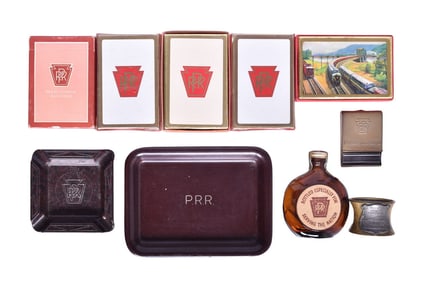 Group of Pennsylvania Railroad Items - Old Forester Bottle, Brass Match Case, Sealed Playing Cards,