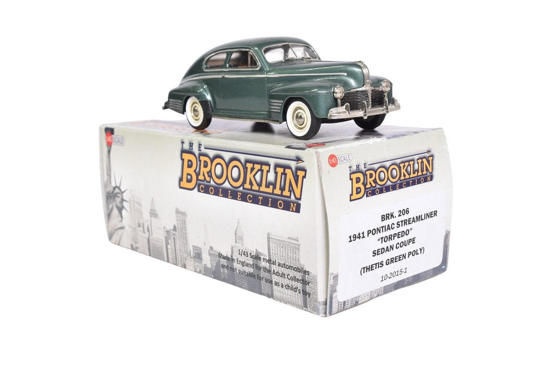 Brooklin BRK206 1941 Pontiac Streamliner "Torpedo" Sedan Coupe: Brooklin BRK206 1941 Pontiac Streamliner "Torpedo" Sedan Coupe Brooklin white metal 1:43 scale BRK206 1941 Pontiac Streamliner "Torpedo" Sedan Coupe in Thetis green poly. Original box and foam, like n