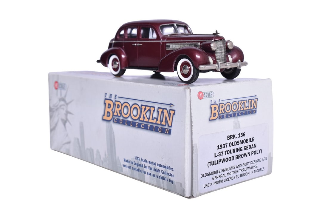 Brooklin BRK156 1937 Oldsmobile L-37 Touring Sedan: Brooklin BRK156 1937 Oldsmobile L-37 Touring Sedan Brooklin white metal 1:43 scale BRK156 1937 Oldsmobile L-37 Touring Sedan in Tulipwood Brown Poly. Original box and bag, like new condition. Box size