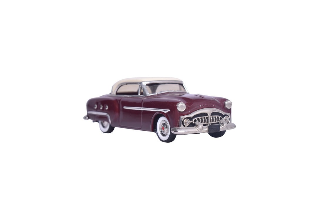 Brooklin BRK55 1951 Packard Mayfair: Brooklin BRK55 1951 Packard Mayfair Brooklin white metal 1:43 scale BRK55 1951 Packard Mayfair in maroon with a cream roof. No original packaging, missing hood ornament. Box size 8" x 8" x 4"