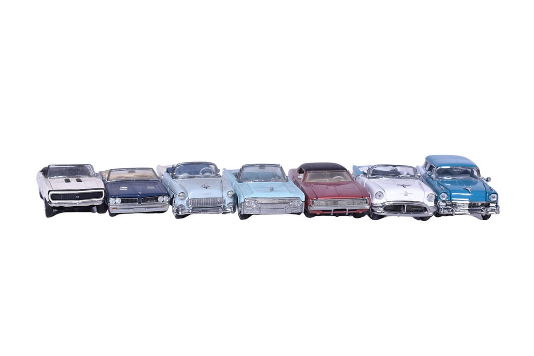 Seven Franklin Mint Models - Oldsmobile, Chevrolet, Pontiac, Lincoln and Dodge: Seven Franklin Mint diecast 1:43 scale model cars. Includes 1950s Oldsmobile 98 Starfire, 1960s Chevrolet Camaro SS 350, 1960s Pontiac GTO, 1950s Chevy Bel Air, 1960s Lincoln Continental Convertible,