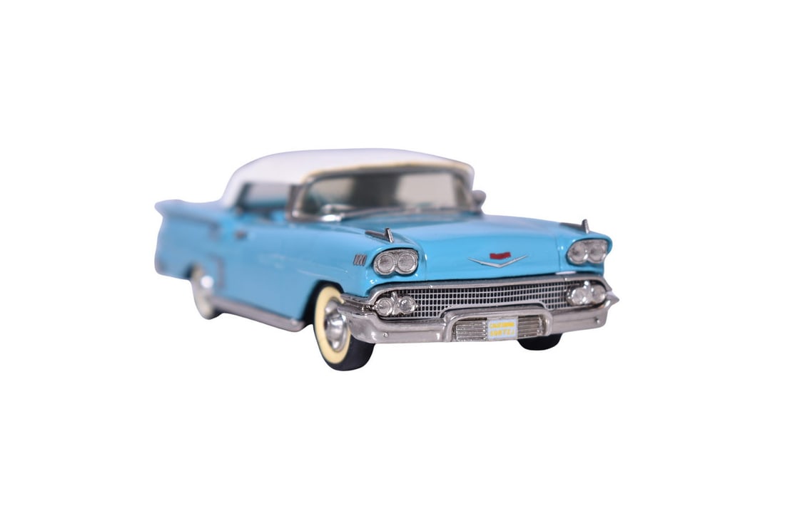 Mini Marque 1958 Chevrolet Impala: Mini Marque white metal 1:43 scale 1958 Chevrolet Impala in blue and white. Car does not come with original packaging, detached passenger side metal detail.