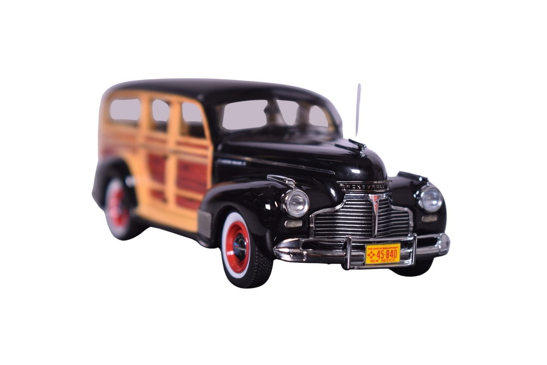 NEO Scale Models 1941 Chevrolet Special Deluxe Station Wagon: NEO Scale Models resin 1:43 scale 1941 Chevrolet Special Deluxe Station Wagon in black. Car comes with original plastic display case, peeling edge on the front windshield.