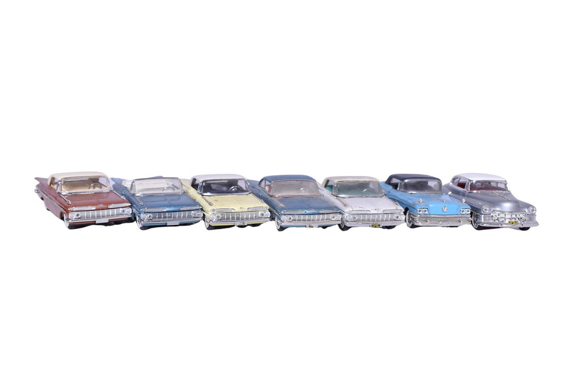 Seven Vitesse Models: Seven Vitesse resin 1:43 scale models, including five 1959 Chevrolet Impalas, a Cadillac, and a Buick. No original packaging, Cadillac is missing side mirrors.