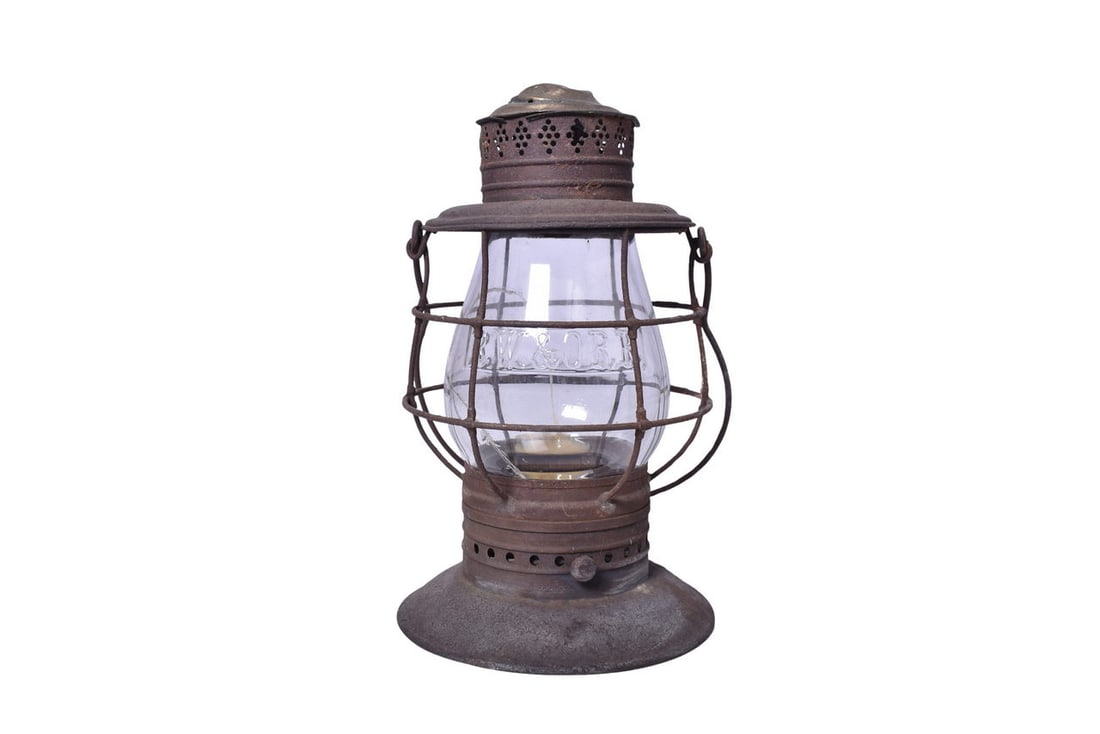 Unmarked Brass Top Bell Bottom Railroad Lantern w/ Rome Watertown and Ogdensburg Cast Globe: Brass top bell bottom lantern with no clear railroad markings on the body. Brass top is moderately dented with some spots of tarnish, rest of the lantern has mild rust and pitting, lid latch is missin