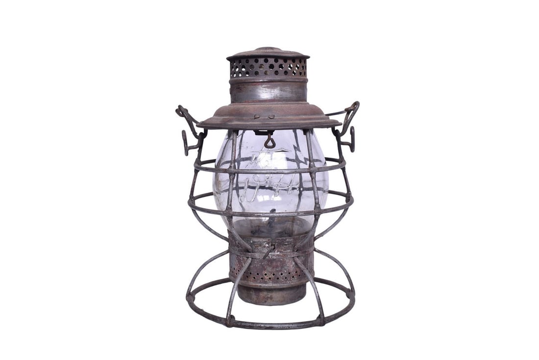 Adlake Reliable Delaware and Hudson Railroad Lantern with Clear Cast D&H Globe: Adams & Westlake Adlake Reliable lantern with D&H Co. embossed on the shoulder. Latest patent date found on the shoulder rim reads Apr. 1 1913. Double-wire guard body is in good condition with some mi