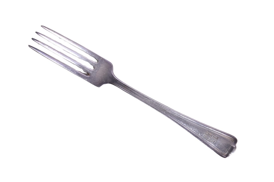 Rutland Railroad Meriden Brita Co. Silver Dinner Fork: A 7" dinner fork for the Rutland Railroad top marked with the Rutland Railroad box logo on the handle by Meriden Brita Co. The flatware retains a strong top mark but shows general use with scratches,