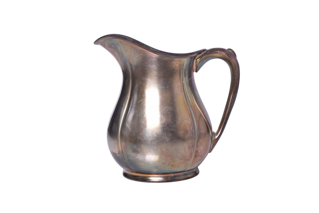Large Chicago Milwaukee and St. Paul Railway Silver Water Pitcher: A large 6 pint dining car silver plated water pitcher for the Milwaukee Road, bottom stamped CM&StP in fancy font International Silver Co. 03000 6 Pts, with a crescent moon and star date icon. Pitcher