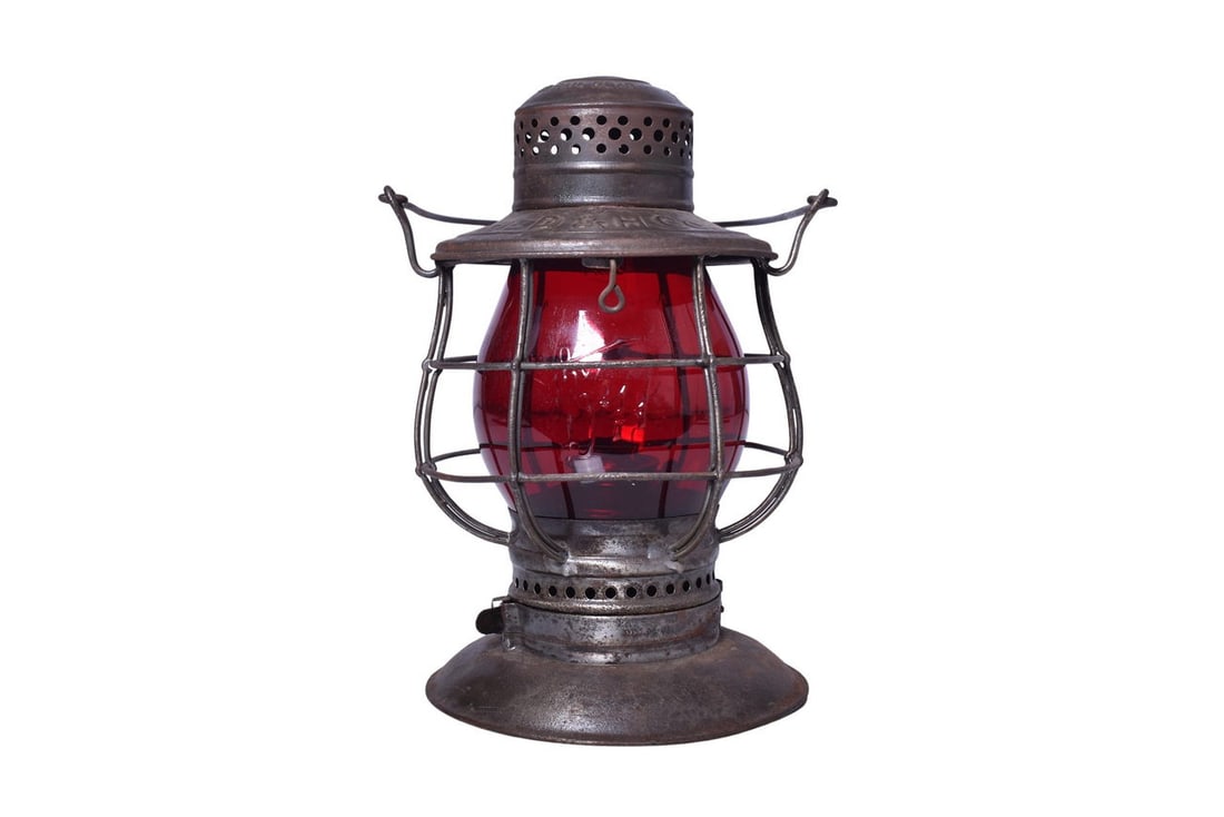 C.T. Ham No. 39 Delaware and Hudson Railroad Lantern with Red Cast The D&H Globe: C.T. Ham bell bottom lantern with D&H CO. embossed on the shoulder. Lantern has some mild pitting and rust and the top horizontal wire is disconnected to the left of the lid hinge. Burner pot and foun