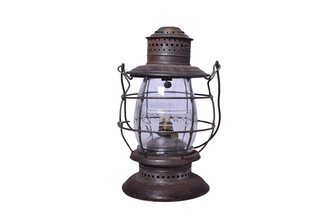 Brass Top Bell Bottom New York Lake Eric & Western Railroad Lantern: Brass top bell bottom lantern with NYLE&W RR embossed on the shoulder. Lantern has a couple dents in the brass top, a small hole in the shoulder and some rust at the edge of the bell bottom. Burner pi