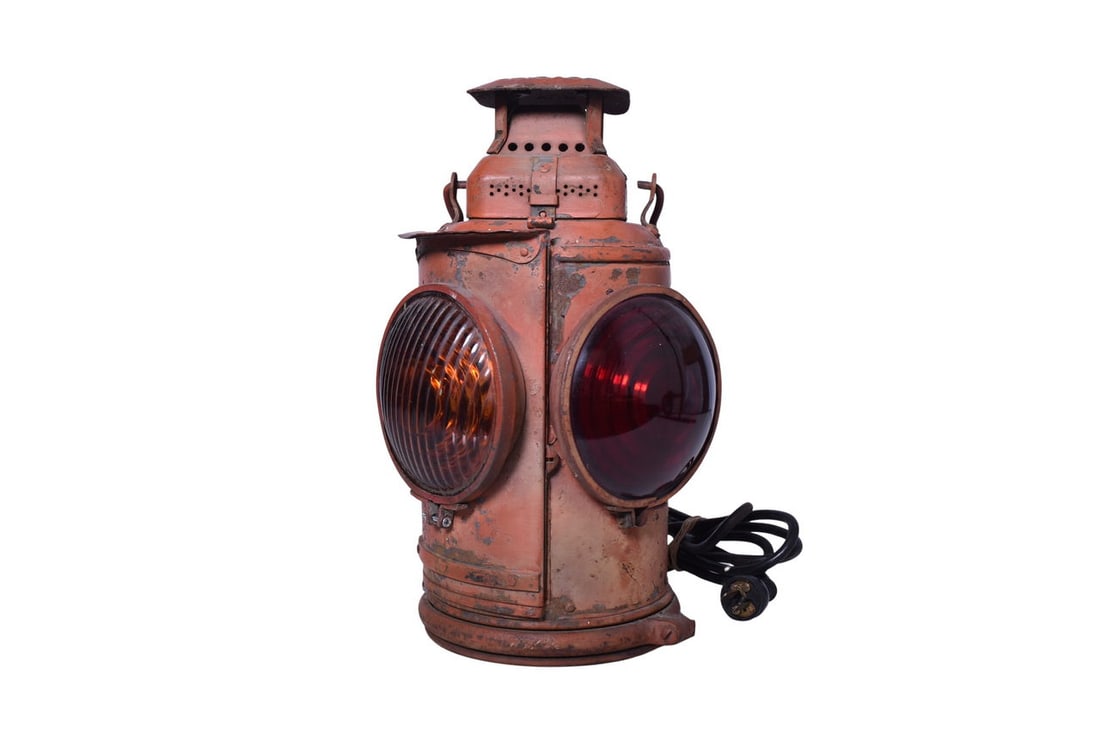 Adams & Westlake New York Central Railroad Caboose Marker Lamp: Lamp includes an embossed N.Y.C.S. tag on the chimney of lamp. Equipped with three amber and one red lenses, all in good condition. No burner pot or fount and the body is in unrestored. There has been