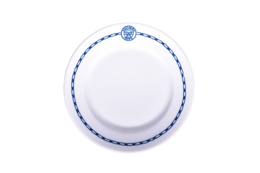 Southern Pacific Lines Railroad China Ravenna Plate: A 5 1/2" small plate for the Southern Pacific Railroad in the Ravenna pattern, top marked with the Sunset logo and bottom marked Syracuse 3 Ravenna Design Copyrighted 1919. This pattern is believed to