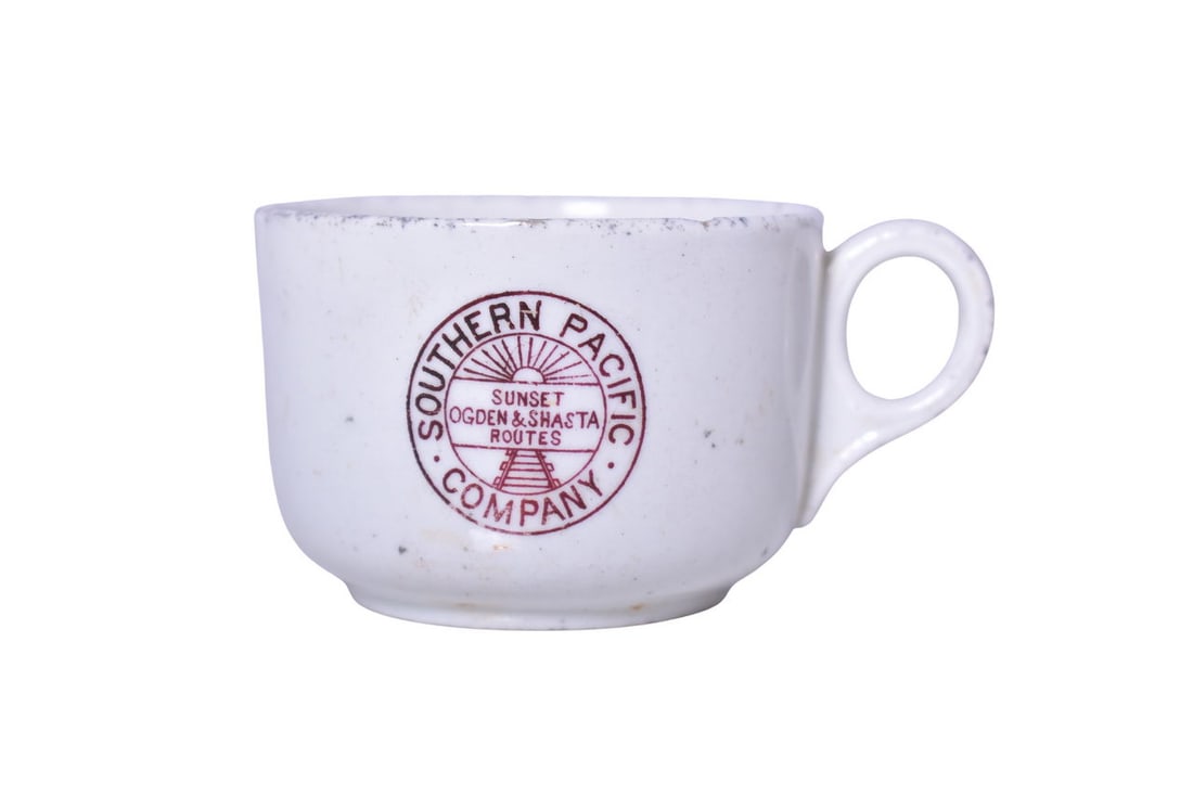 Southern Pacific Railroad China Stanford Maroon Demitasse Cup: A 1 3/4" tall by 2 1/2" diameter demi cup for the Southern Pacific Railroad in the Stanford pattern, side marked with the Sunset Ogden & Shasta Routes logo, no makers mark. Pieces in this pattern date