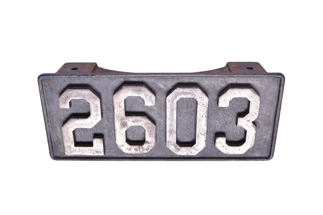 Illinois Central #2603 Locomotive Front Number Plate: Pyle National made cast front number plate from 4-8-2 locomotive #2603. The locomotive was built at the Paducah shops and scrapped in 1960. The plate measures 17" x 7" with a Pyle National casting num