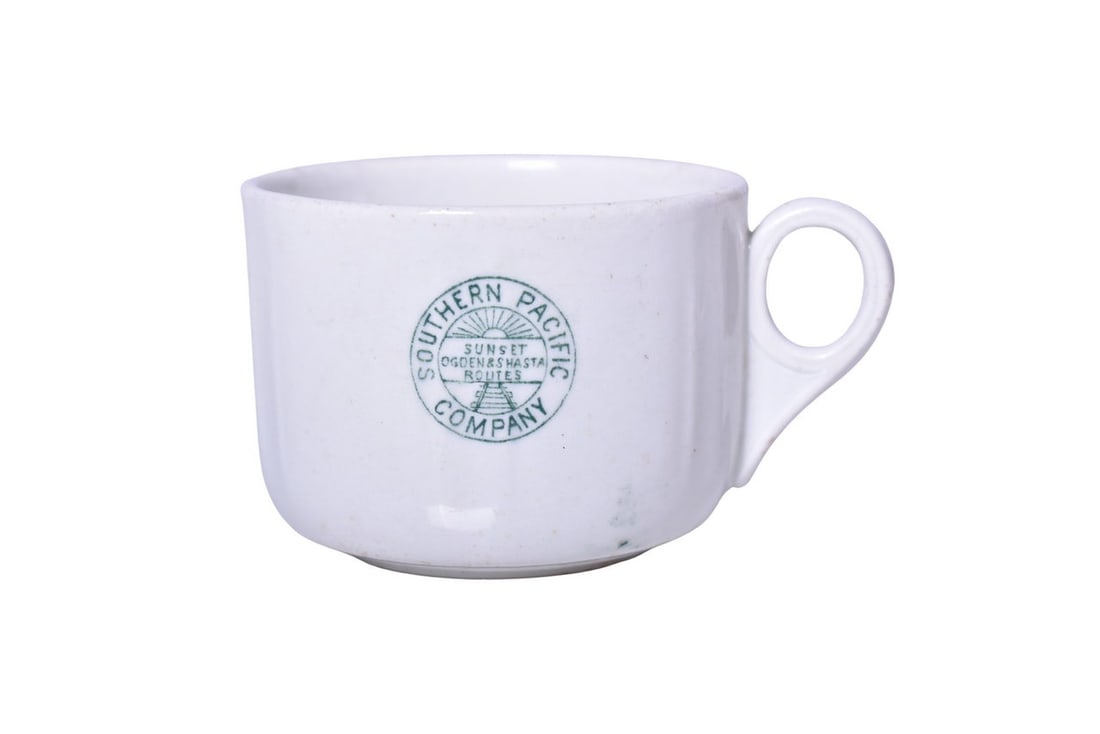 Southern Pacific Railroad China Stanford Green Cup: A 2 1/2" tall by 3 3/8" diameter coffee cup for the Southern Pacific Railroad in the Stanford pattern, side marked with the Sunset Ogden & Shasta Routes logo, no makers mark. Pieces in this pattern da
