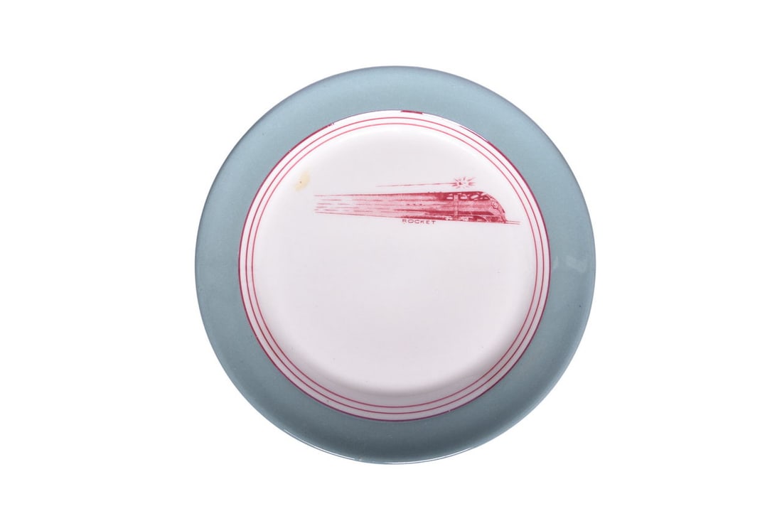 Chicago Rock Island Railroad Buffalo China Sage Green Rocket Bread Plate: A 5 5/8" small plate for the Chicago Rock Island Railroad in the Sage Green Rocket Logo pattern, top marked with Rocket graphic and bottom stamped Buffalo Sage Green Lamelle Made For C.R.I.R.R. Albert